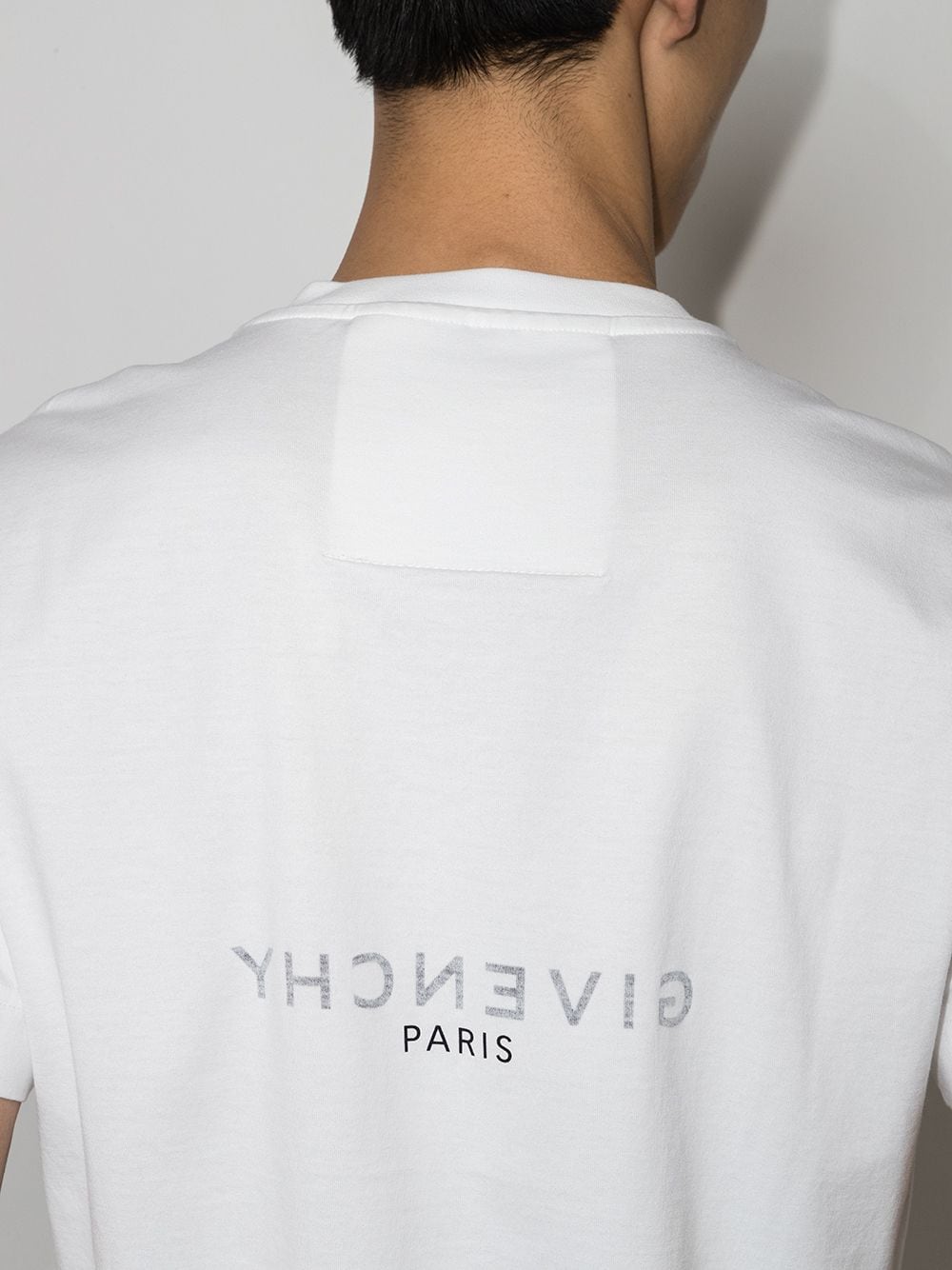 Givenchy – Oversize-T-Shirt mit Reverse-Paris-Logoprint in Weiß