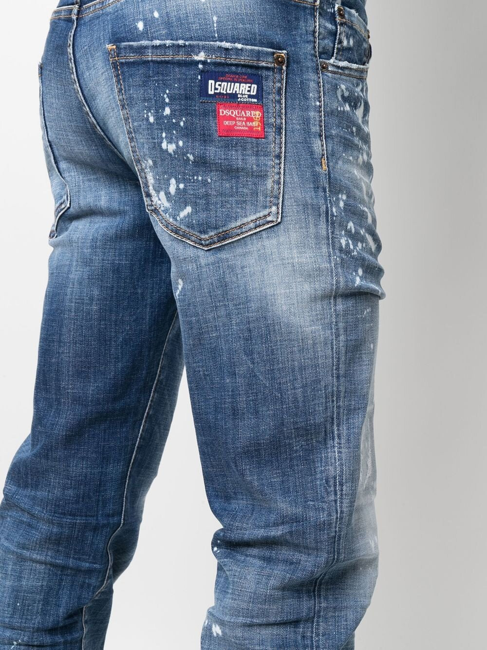 Dsquared2 – Cool Guy – Schmale Jeans mit gebleichten Flecken in Blau 