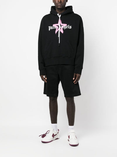 Palm Angels – Kapuzenpullover mit rosa Stern-Sprühdruck in Schwarz 