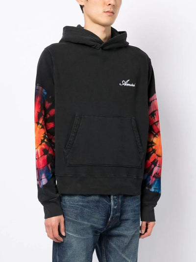 Amiri – Gepunkteter Kapuzenpullover mit Batikmuster in Schwarz