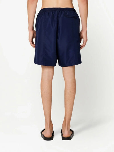 AMI Paris – Badeshorts mit gesticktem Logo in Marineblau