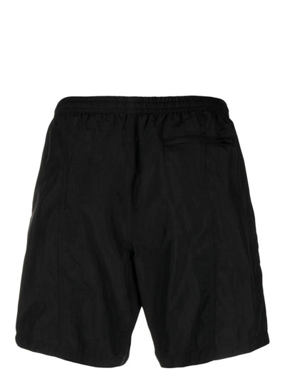 AMI PARIS – Badeshorts mit gesticktem Logo in Schwarz