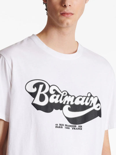 Balmain – Weißes T-Shirt mit Logo-Print im Stil der 70er 