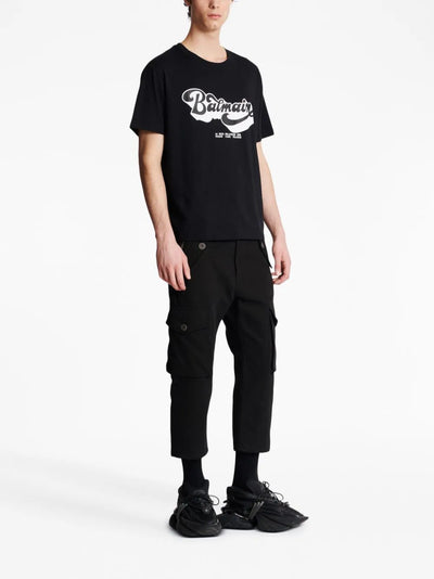 Balmain – Schwarzes T-Shirt mit Logo-Print im Stil der 70er 