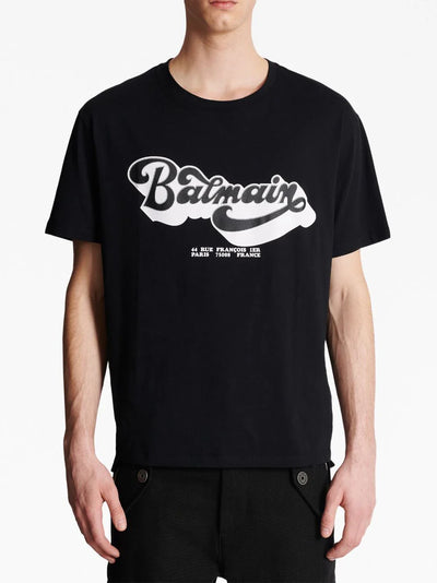 Balmain – Schwarzes T-Shirt mit Logo-Print im Stil der 70er 
