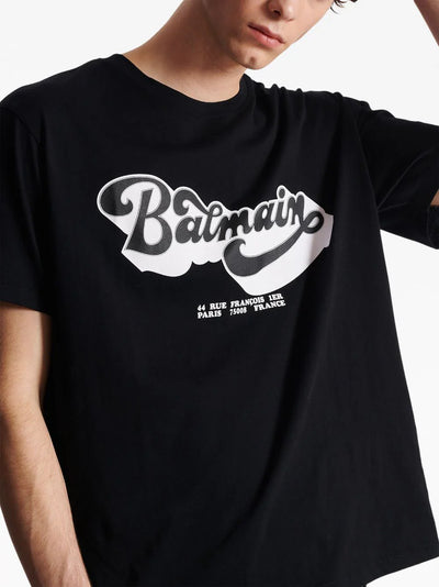 Balmain – Schwarzes T-Shirt mit Logo-Print im Stil der 70er 