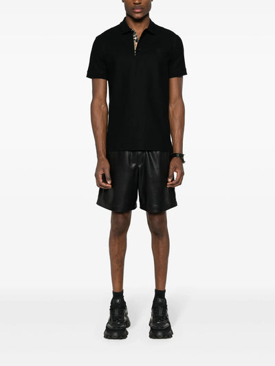 Burberry – Schwarzes Poloshirt mit Circle-TB-Logostickerei