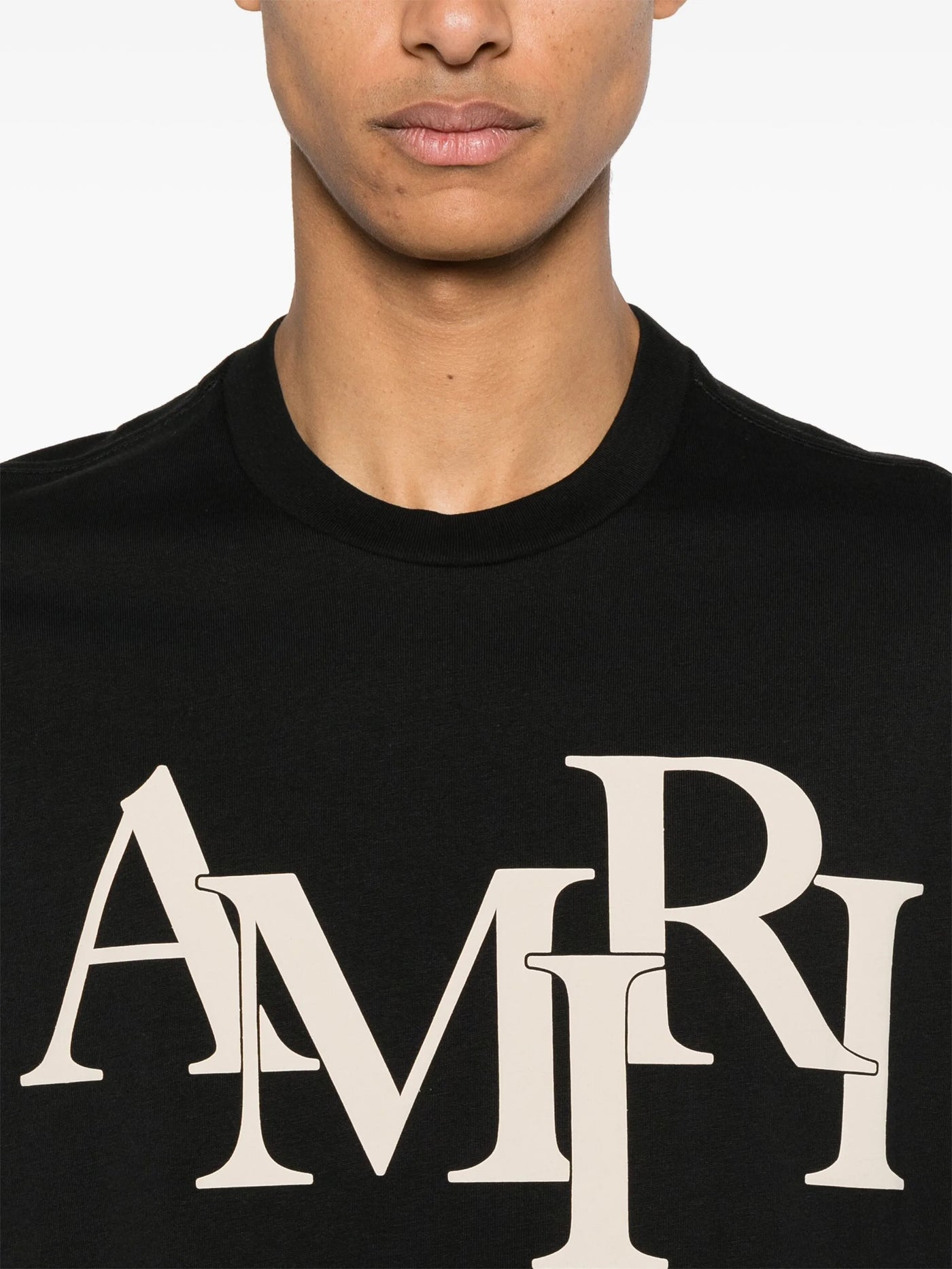 Amiri – Beiges T-Shirt mit gestaffeltem Logo-Print in Schwarz