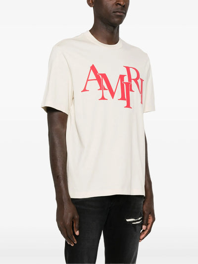 Amiri – T-Shirt mit gestaffeltem Logo-Print in Rot in Hellbeige