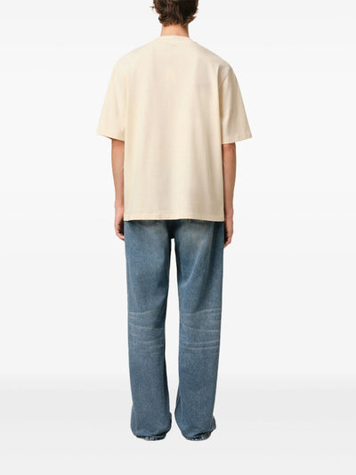 AMI PARIS T-Shirt mit gesticktem Logo in Weißcreme