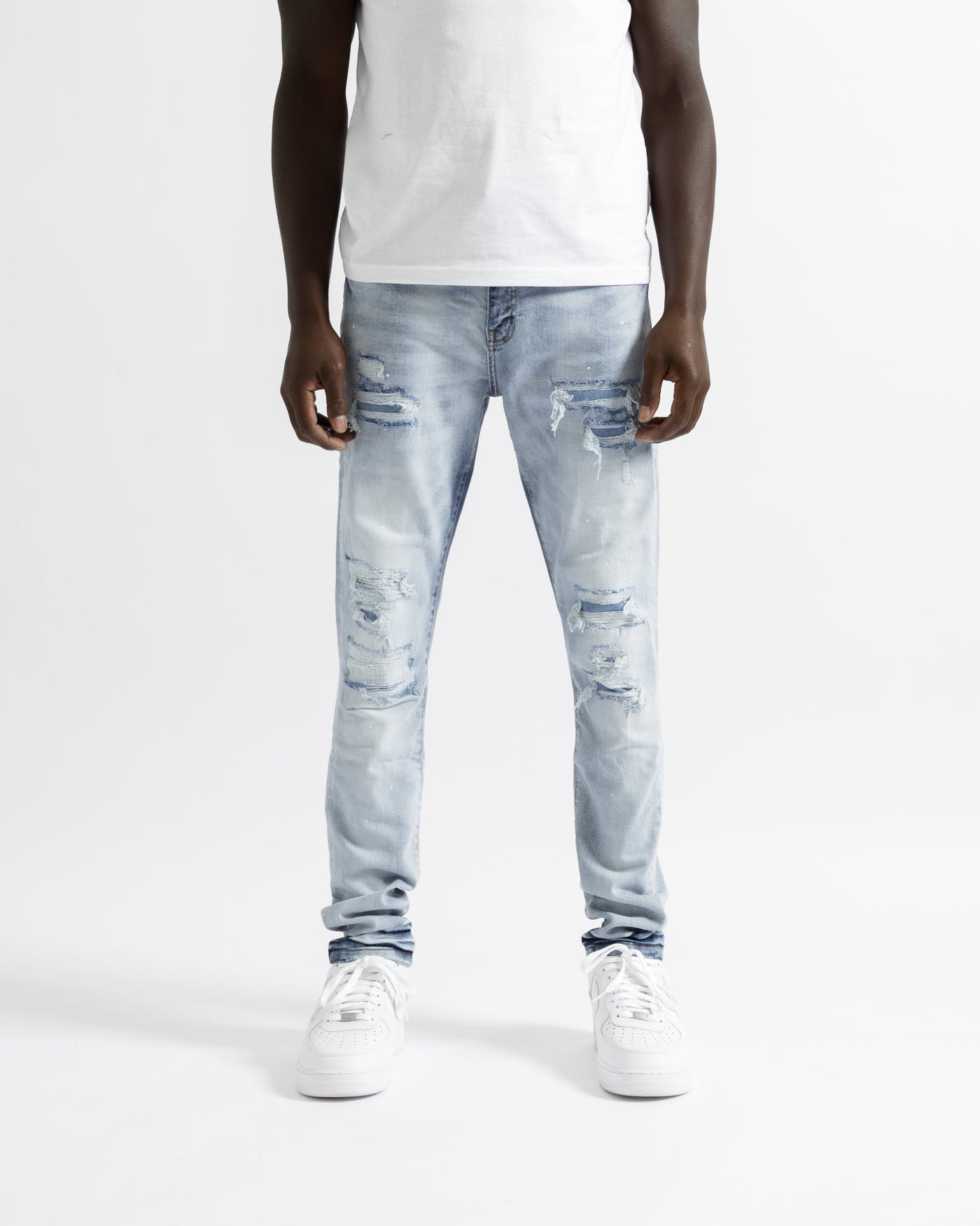 Magiri Paris – Zerrissene Jeans im Used-Look in Hellblau