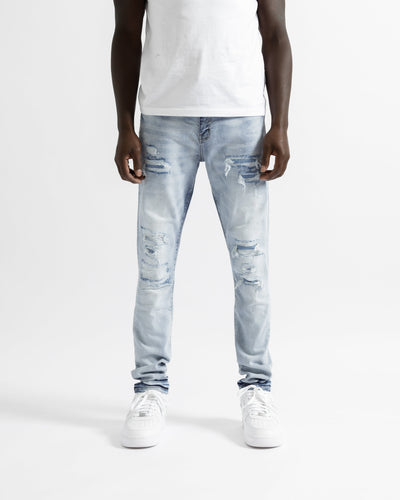 Magiri Paris – Zerrissene Jeans im Used-Look in Hellblau