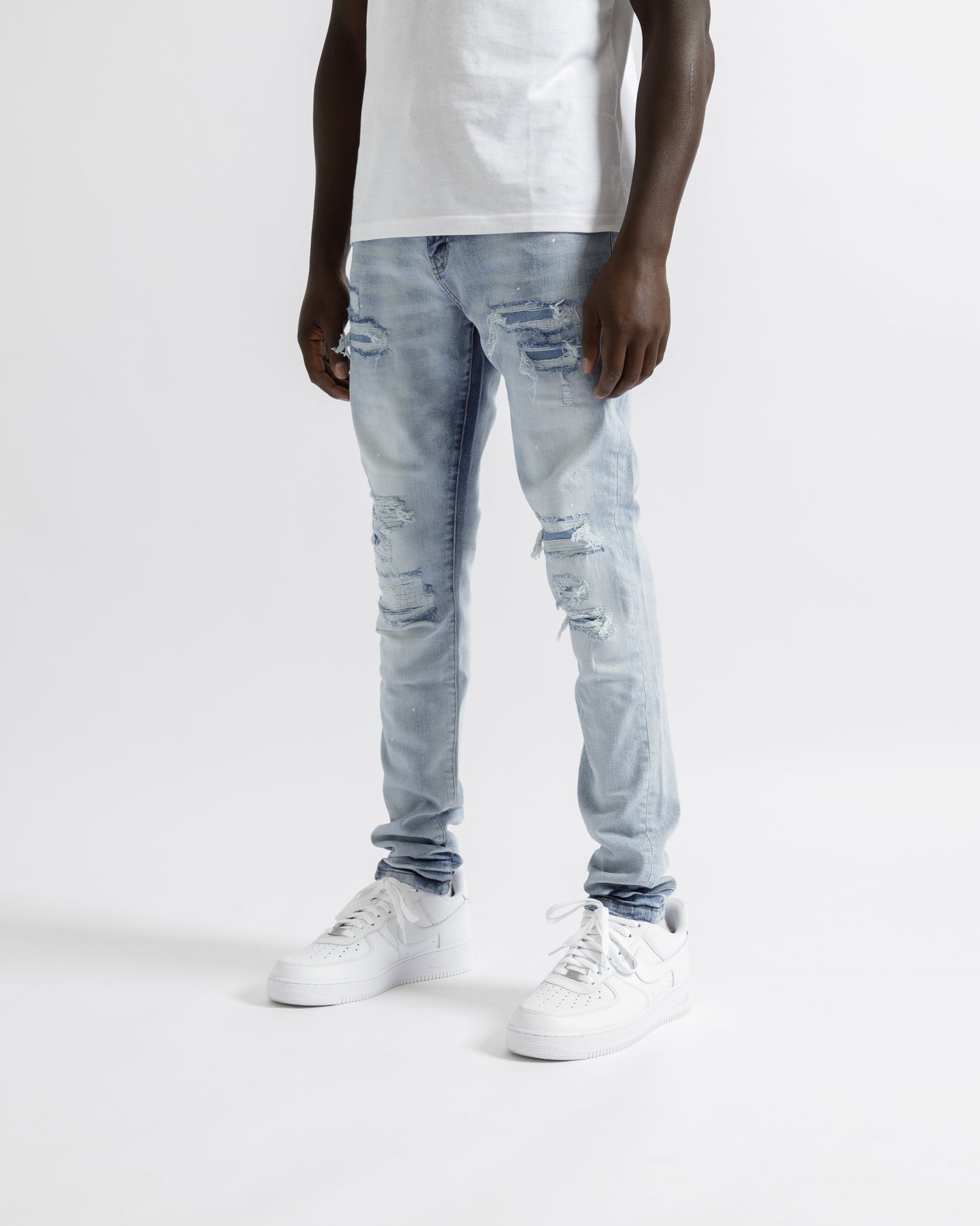 Magiri Paris – Zerrissene Jeans im Used-Look in Hellblau
