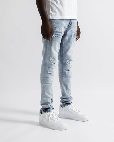 Magiri Paris – Zerrissene Jeans im Used-Look in Hellblau