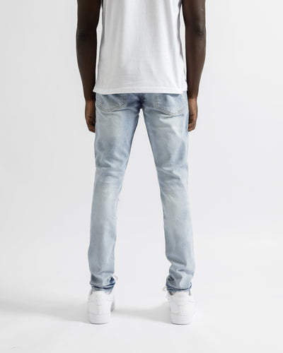 Magiri Paris – Zerrissene Jeans im Used-Look in Hellblau