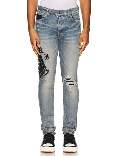 Amiri – Wes Lang – Jeans mit Reaper-Logo in Clay Indigoblau