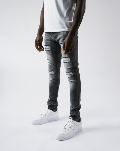 Magiri Douai – Graue Jeans mit zerrissenen Patches