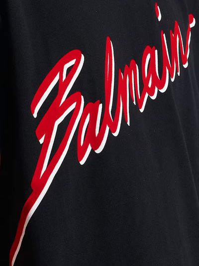 Balmain – Schwarzes T-Shirt mit beflocktem roten Buchstabenlogo