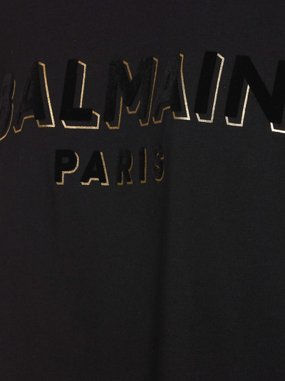 Balmain Oversize-T-Shirt mit Rundhalsausschnitt und Samtlogo in Schwarz