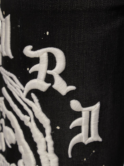 Amiri – Wes Lang – Schwarze Jeans mit Reaper-Logo im Aged-Look