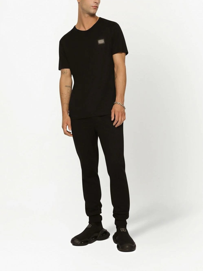 Dolce &amp; Gabbana – Schwarzes T-Shirt mit silbernem Logo