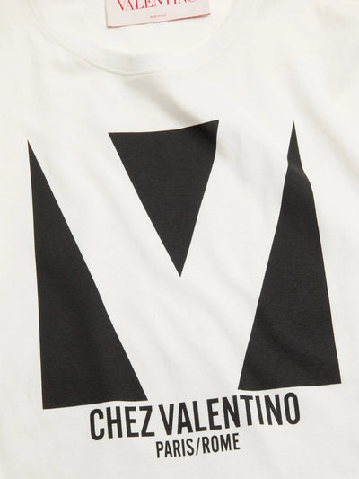 Valentino – Jersey-T-Shirt mit Chez Valentino-Print in Weiß