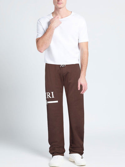 Amiri – Jogginghose mit MA-Bar-Logo-Aufdruck in Braun