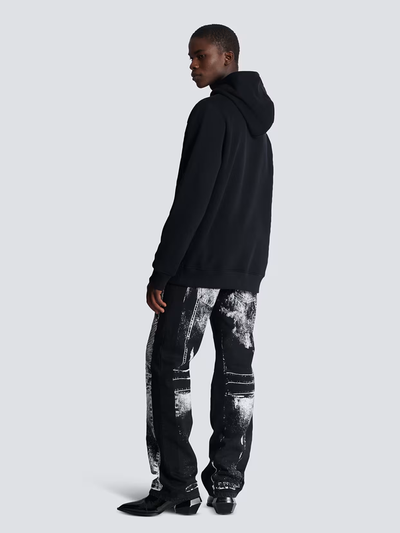Balmain – Kapuzenpullover mit beflocktem Logo-Schriftzug in Schwarz