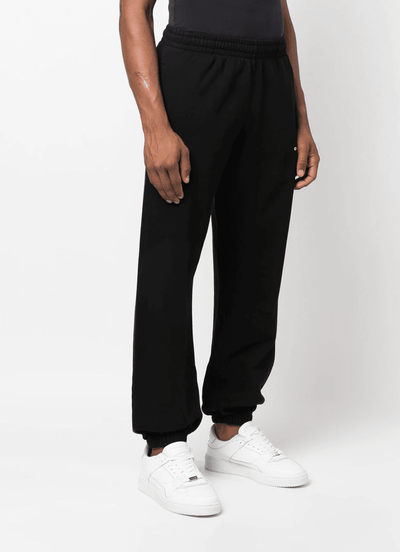 Off-White – Schmale Jogginghose mit Wellenkontur in Schwarz