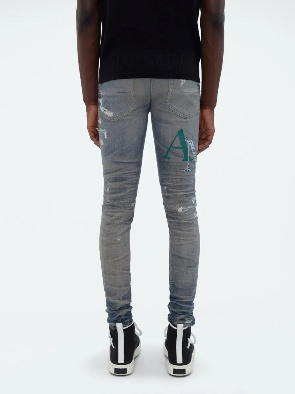 Amiri – Blaue Jeans aus Leder mit versetztem Logo