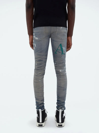 Amiri – Blaue Jeans aus Leder mit versetztem Logo