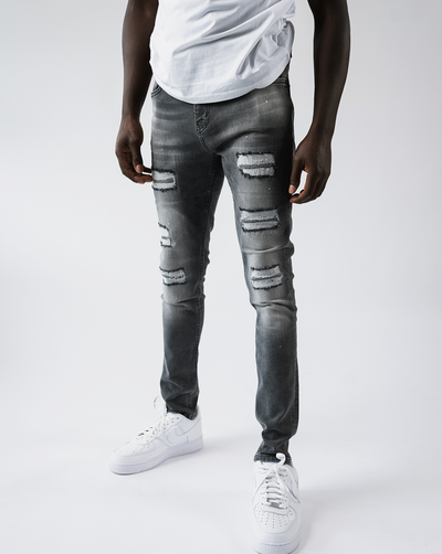 Magiri Douai – Graue Jeans mit zerrissenen Patches