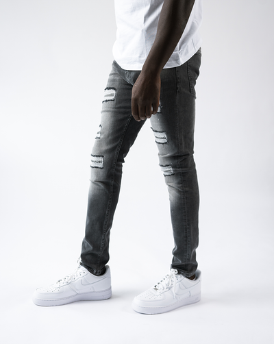 Magiri Douai – Graue Jeans mit zerrissenen Patches