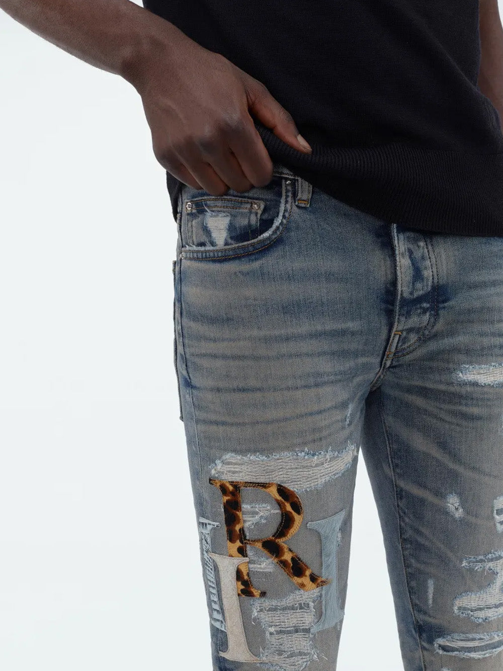 Amiri – Blaue Jeans aus Leder mit versetztem Logo
