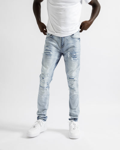 Magiri Paris – Zerrissene Jeans im Used-Look in Hellblau