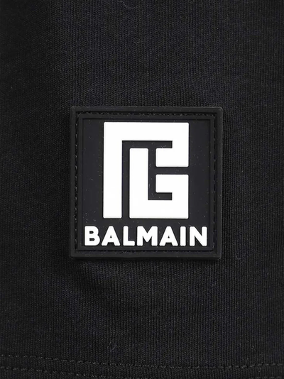 Balmain – Oversize-T-Shirt mit Logo-Aufdruck auf der Rückseite in Schwarz